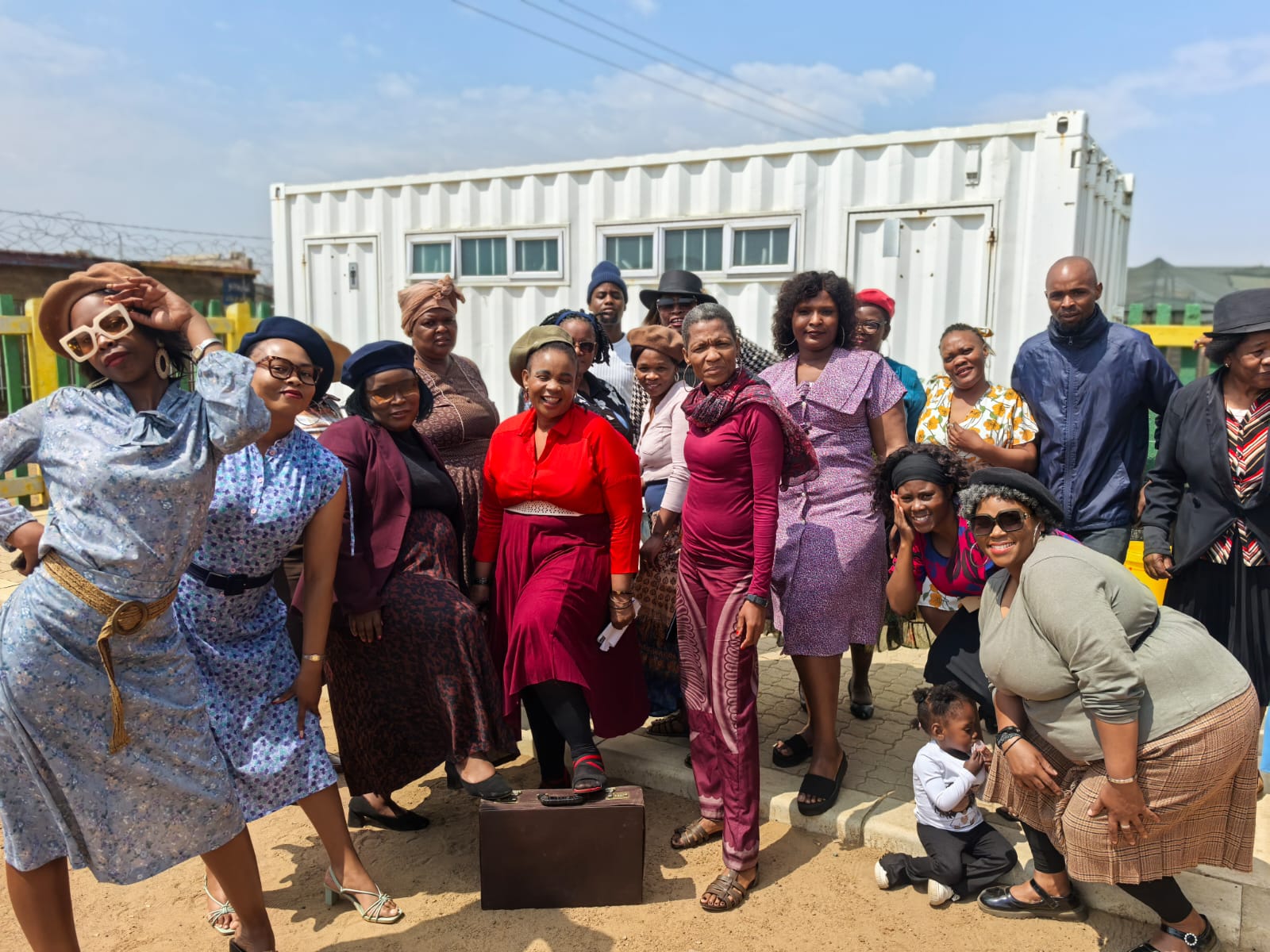 Women gathered joyfully at a community event